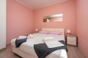 Postel nebo postele na pokoji v ubytování Apartment in Crikvenica 39218