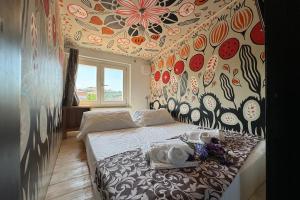 Postel nebo postele na pokoji v ubytování Terrazzino Frontemare Wi-Fi Free Parking