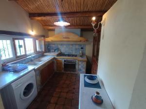 Kuchyň nebo kuchyňský kout v ubytování Villa Gemma