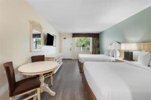 Letto o letti in una camera di Best Western Gateway To The Keys - Florida City, Homestead, Everglades