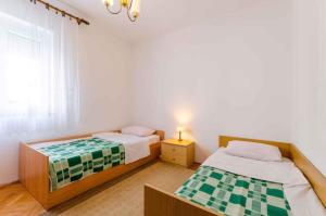 Fotografia z galérie ubytovania Apartment in Crikvenica 14212 v destinácii Crikvenica