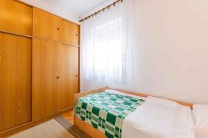 Fotografia z galérie ubytovania Apartment in Crikvenica 14212 v destinácii Crikvenica