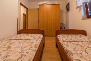 Posteľ alebo postele v izbe v ubytovaní Two-Bedroom Apartment in Crikvenica XXXVII