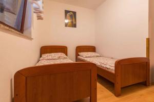 Posteľ alebo postele v izbe v ubytovaní Two-Bedroom Apartment in Crikvenica XXXVII