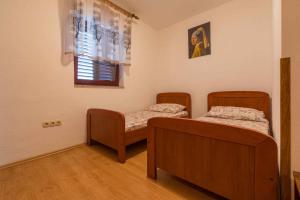 Posteľ alebo postele v izbe v ubytovaní Two-Bedroom Apartment in Crikvenica XXXVII