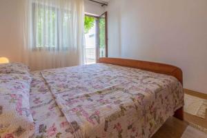 Posteľ alebo postele v izbe v ubytovaní Two-Bedroom Apartment in Crikvenica XXXVII