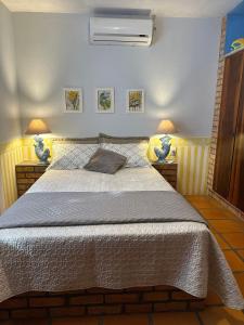 Ένα ή περισσότερα κρεβάτια σε δωμάτιο στο Casa 1 Suíte+3 - 200m Praia e 700m Beto Carrero