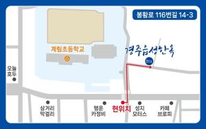 a map of a city with a street sign at Gyeongju eupseong dokchae hanok in Gyeongju