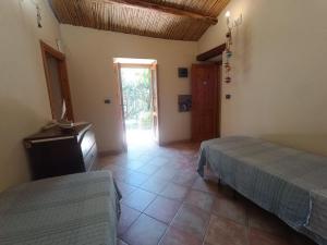 Postel nebo postele na pokoji v ubytování Villa Gemma