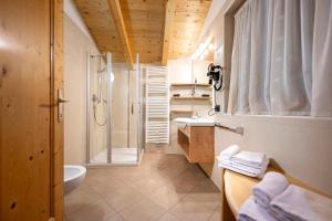 Koupelna v ubytování Hotel Brunello