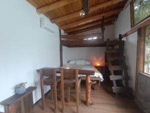 Postel nebo postele na pokoji v ubytování Refugio Capullos de Luna