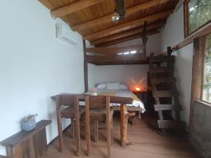 Postel nebo postele na pokoji v ubytování Refugio Capullos de Luna