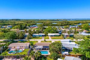 an aerial view of a resort with a pool at 721 Java Rd in Cocoa Beach