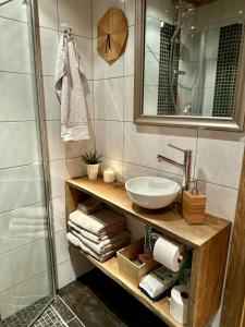 a bathroom with a sink and a shower at Family-Friendly Mountain Cabin At Haglebu in Eggedal