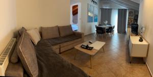 a living room with a couch and a table at Sami Loft in Sami