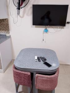 TV a/nebo společenská místnost v ubytování Tiba Golden Resort Hurghada + 4 fotografie