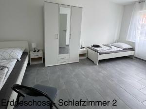 Postel nebo postele na pokoji v ubytování Zuhause auf Zeit in Efferen