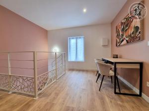 a room with a desk and a table and a window at Maison spacieuse avec jardin, près de Disneyland et Reims, idéale pour familles et amis - FR-1-532-22 in Viels-Maisons +27 photos