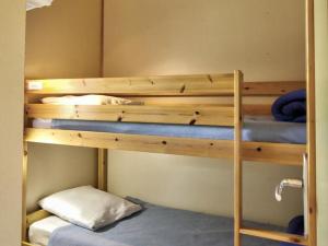 a bunk bed room with two bunk beds in it at Chalet familial 35m² aux Monts de la Madeleine avec terrasse, animaux acceptés - FR-1-496-240 in Saint-Rirand