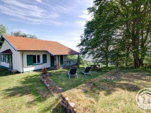 Zahrada ubytování Gîte chalet autrichien avec cheminée et animaux acceptés - FR-1-496-177
