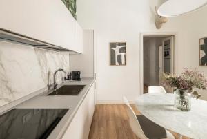 Köök või kööginurk majutusasutuses La Dépendance Hotel