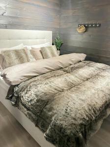 Postel nebo postele na pokoji v ubytování Modern Apartment At Strandafjellet Ski Resort + 17 fotografií