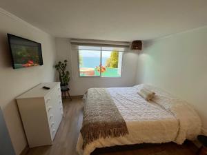 Postel nebo postele na pokoji v ubytování Casa en el arbol
