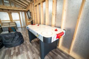a bathroom with a sink in a room at Lush Hideaway with HotTub & Pool 6 mins kings Island in Mason