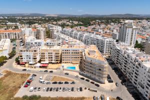 an aerial view of a city with buildings at Espadarte - Sea view by HD in Quarteira