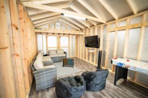 an overhead view of a living room in a tiny house at Lush Hideaway with HotTub & Pool 6 mins kings Island in Mason