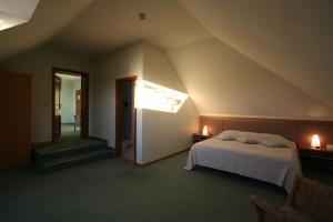 Postel nebo postele na pokoji v ubytování Hotel Sanvilla
