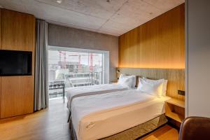 Letto o letti in una camera di Placid Hotel Design & Lifestyle Zurich