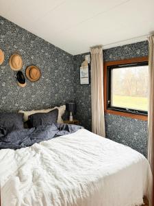 En eller flere senge i et værelse på Authentecity Between Forest And Beach In Odsherred