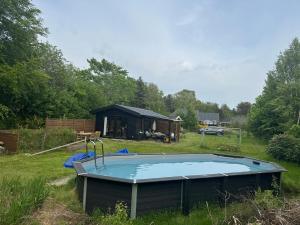 Swimmingpoolen hos eller tæt på Authentecity Between Forest And Beach In Odsherred + 7 billeder