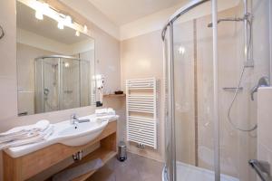 Koupelna v ubytování Hotel Brunello