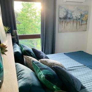 En eller flere senge i et værelse på Restored Farmhouse Near Toulouse With Pool + 13 billeder