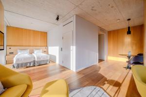Letto o letti in una camera di Placid Hotel Design & Lifestyle Zurich