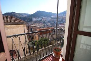 a balcony with a view of a city at Cosenza Vecchia: arte & storia in Cosenza