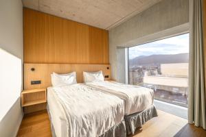 Letto o letti in una camera di Placid Hotel Design & Lifestyle Zurich