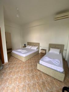 Postel nebo postele na pokoji v ubytování Guesthouse SELI