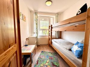 Postel nebo postele na pokoji v ubytování Ferienwohnung De Diek 103