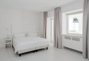 Кровать или кровати в номере Hotel Posa Posa