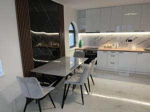 Kuchyň nebo kuchyňský kout v ubytování Apartman Zoja