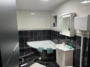 Koupelna v ubytování Apartman Zoja