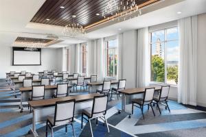 a conference room with tables and chairs and windows at Hyatt Place National Harbor in National Harbor +43 photos