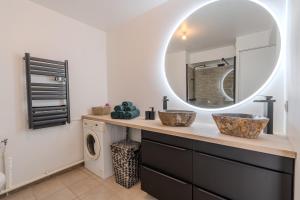 Ένα μπάνιο στο Bel Appartment à 5 min de Disneyland Paris - Parking gratuit +26 φωτογραφίες