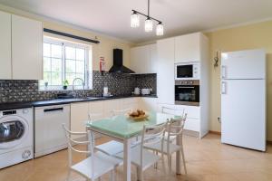 Η κουζίνα ή μικρή κουζίνα στο GuestReady – Charming Getaway by Madeira's Nature