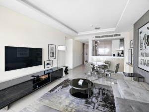 Televisyen dan/atau pusat hiburan di The Signature Suite 1BDR in Paramount Tower A
