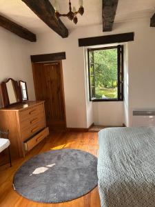 Postel nebo postele na pokoji v ubytování Le Clos des Fées