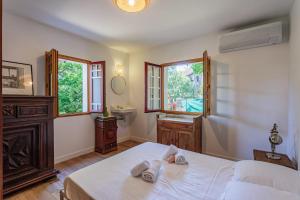Ένα ή περισσότερα κρεβάτια σε δωμάτιο στο Appartement Gracieuse - Welkeys